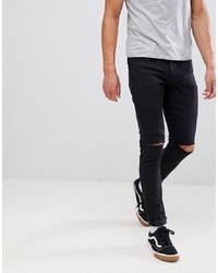 Jeans aderenti strappati neri di Mennace