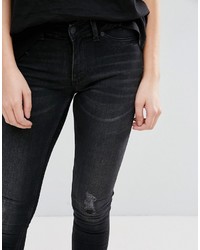 Jeans aderenti strappati neri di Cheap Monday