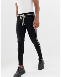 Jeans aderenti strappati neri di The Couture Club