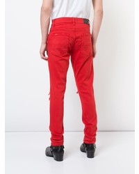 Jeans aderenti strappati rossi di Amiri