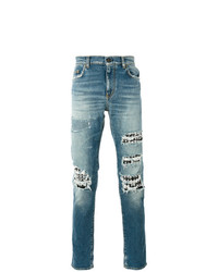 Jeans con borchie azzurri di Saint Laurent