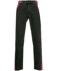 Jeans effetto tie-dye neri di Marcelo Burlon County of Milan