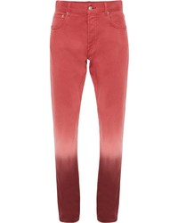 Jeans effetto tie-dye rossi di Alexander McQueen