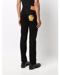 Jeans neri di Versace