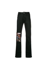 Jeans stampati neri di Raf Simons