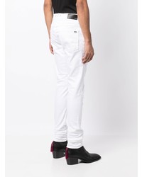 Jeans strappati bianchi di Amiri