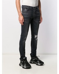 Jeans strappati neri di Unravel Project