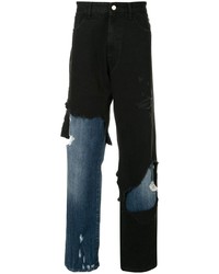 Jeans strappati neri di Raf Simons