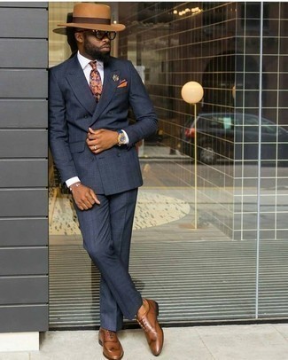 Quale abito indossare con scarpe oxford marrone chiaro per un uomo di 30 anni: Prova a combinare un abito con una camicia elegante bianca per essere sofisticato e di classe. Perfeziona questo look con un paio di scarpe oxford marrone chiaro.
