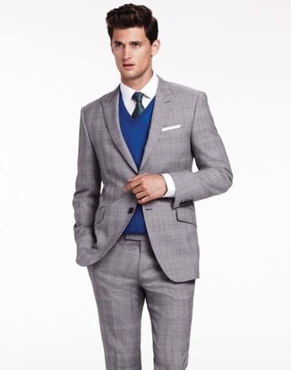Come indossare e abbinare una camicia elegante bianca con un abito grigio quando fa caldo: Opta per un abito grigio e una camicia elegante bianca per una silhouette classica e raffinata