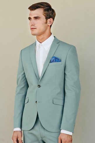 Look alla moda per uomo: Abito verde menta, Camicia elegante bianca, Fazzoletto da taschino blu