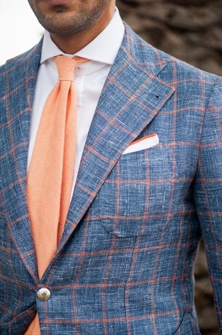 Come indossare e abbinare una cravatta arancione per un uomo di 30 anni in estate 2024: Metti un blazer di lana a quadri blu e una cravatta arancione come un vero gentiluomo. Una eccellente scelta per essere molto elegante e trendy anche in questi mesi estivi.