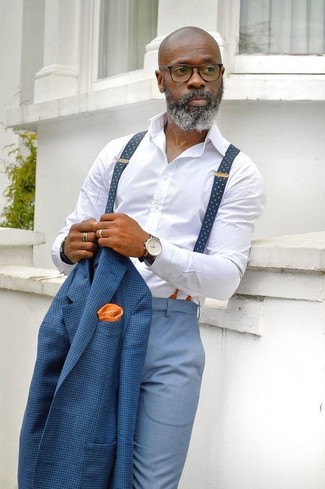 Come indossare e abbinare un fazzoletto da taschino arancione per un uomo di 40 anni in modo formale: Abbina un blazer a quadri blu con un fazzoletto da taschino arancione per un look comfy-casual.