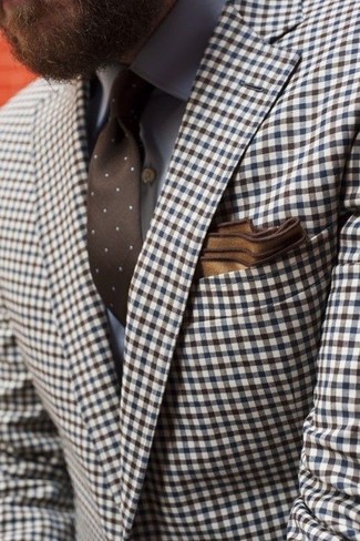 Come indossare e abbinare una camicia elegante grigia con un blazer a quadretti marrone per un uomo di 30 anni: Scegli un outfit composto da un blazer a quadretti marrone e una camicia elegante grigia per essere sofisticato e di classe.
