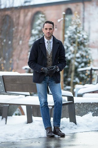 Quale gilet indossare con stivali casual terracotta in inverno 2025: Vestiti con un gilet e jeans blu per un look elegante e di classe. Per un look più rilassato, calza un paio di stivali casual terracotta. Ecco una fantastica scelta per creare il perfetto outfit invernale.