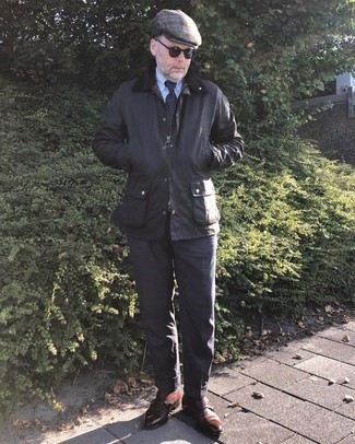 Trend da uomo 2024 quando fa freddo in modo formale: Prova ad abbinare una giacca leggera marrone scuro con pantaloni eleganti grigio scuro per essere sofisticato e di classe.