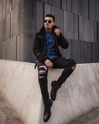 Come indossare e abbinare jeans aderenti neri quando fa gelo: Per un outfit della massima comodità, potresti indossare un giubbotto in shearling nero e jeans aderenti neri. Sfodera il gusto per le calzature di lusso e prova con un paio di stivali chelsea in pelle neri.