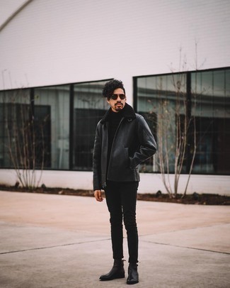 Quale stivali chelsea indossare con un dolcevita nero in inverno 2025: Potresti combinare un dolcevita nero con jeans aderenti neri per vestirti casual. Completa il tuo abbigliamento con un paio di stivali chelsea. Questo è il look eccellente per i mesi invernali.