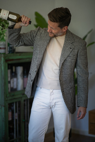 Come indossare e abbinare un cappotto bianco per un uomo di 40 anni quando fa gelo: Prova a combinare un cappotto bianco con jeans bianchi per un abbigliamento elegante ma casual.