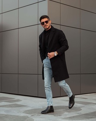 Come indossare e abbinare un soprabito nero per un uomo di 30 anni quando fa freddo: Mostra il tuo stile in un soprabito nero con jeans azzurri per creare un look smart casual. Sfodera il gusto per le calzature di lusso e opta per un paio di stivali chelsea in pelle neri.