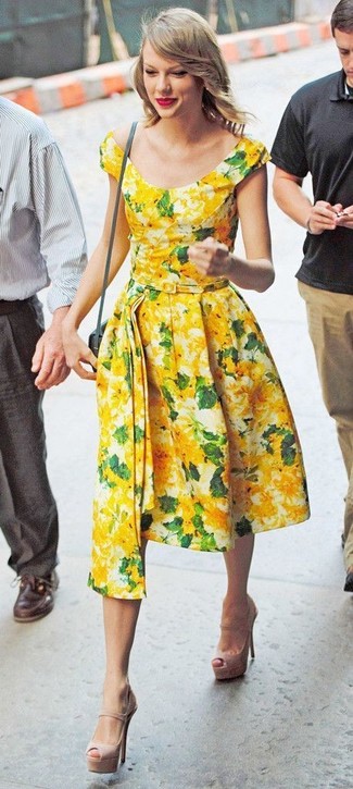 Vestito longuette a fiori dorato di Gucci