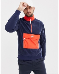 Maglione con zip rosso e blu scuro di Nike