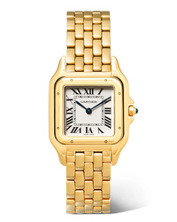 Orologio dorato di Cartier