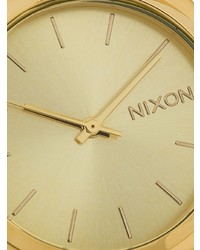 Orologio dorato di Nixon