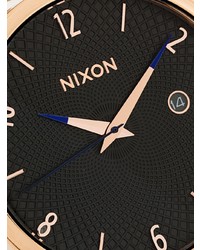 Orologio dorato di Nixon