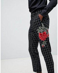 Pantaloni eleganti a fiori neri