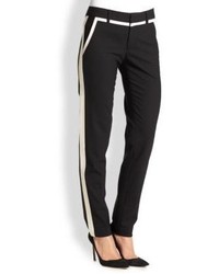 Pantaloni eleganti a righe verticali neri e bianchi