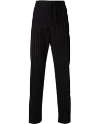 Pantaloni eleganti a righe verticali neri di Ann Demeulemeester