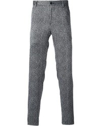 Pantaloni eleganti di lana a spina di pesce grigi di Giorgio Armani