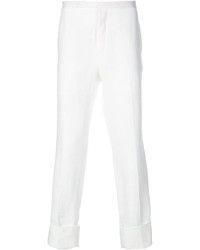 Pantaloni eleganti di lino a righe verticali bianchi