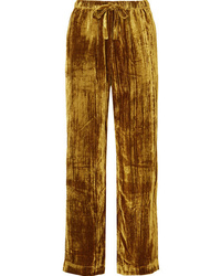 Pantaloni eleganti di velluto dorati