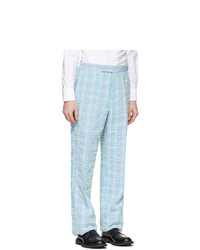 Pantaloni eleganti scozzesi azzurri di Thom Browne