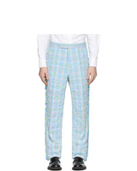 Pantaloni eleganti scozzesi azzurri di Thom Browne