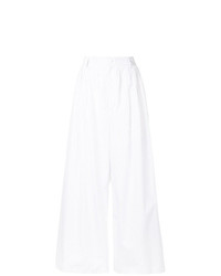 Pantaloni larghi a righe verticali bianchi e neri di MM6 MAISON MARGIELA