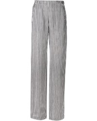 Pantaloni larghi a righe verticali bianchi e neri di Zero Maria Cornejo
