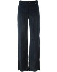 Pantaloni larghi di lana a righe verticali neri di MM6 MAISON MARGIELA