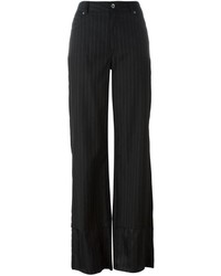 Pantaloni larghi di lana a righe verticali neri di MM6 MAISON MARGIELA