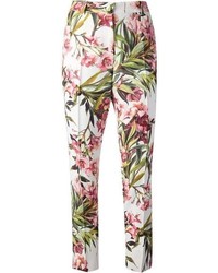 Pantaloni skinny a fiori bianchi e verdi