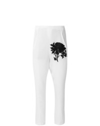 Pantaloni skinny a fiori bianchi di Ann Demeulemeester