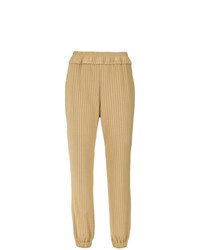 Pantaloni sportivi a righe verticali dorati di Lilly Sarti