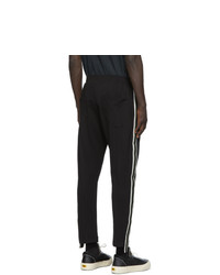 Pantaloni sportivi a righe verticali neri e bianchi di Rhude