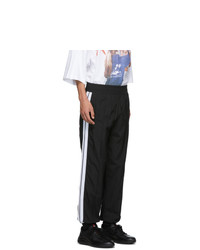 Pantaloni sportivi a righe verticali neri e bianchi di Palm Angels