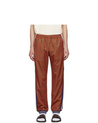 Pantaloni sportivi a righe verticali rossi di Gucci