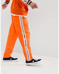 Pantaloni sportivi arancioni di Mennace