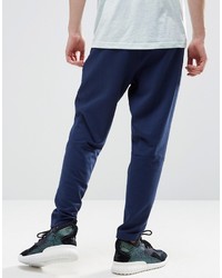 Pantaloni sportivi blu scuro di adidas