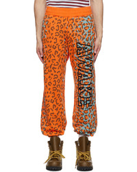 Pantaloni sportivi stampati arancioni di Awake NY